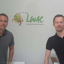 Our partner from USA - Vladas Krivickas with a founding member of LWAC - Marius Markevicius, posing in front of their brand new logo